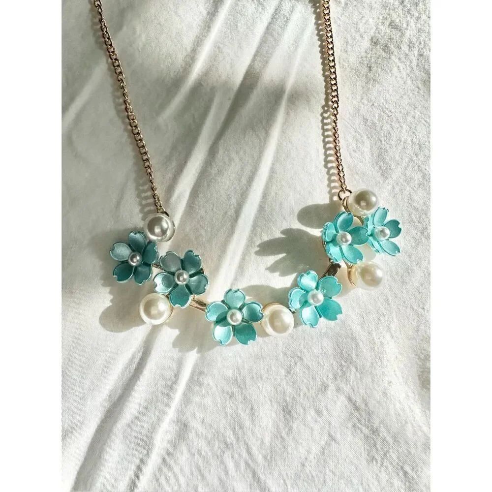 Light blue flower and pearl statement necklace